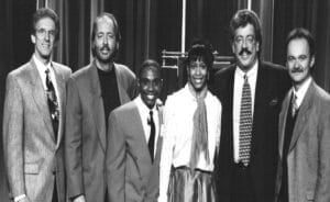 The Magic Comic Jamahl Keyes posing with The Statler Brothers after performing on their Family Channel TV show, celebrating a night of clean comedy and family entertainment.