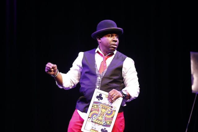 Jamahl Keyes performing comedy magic for a corporate audience in Indianapolis