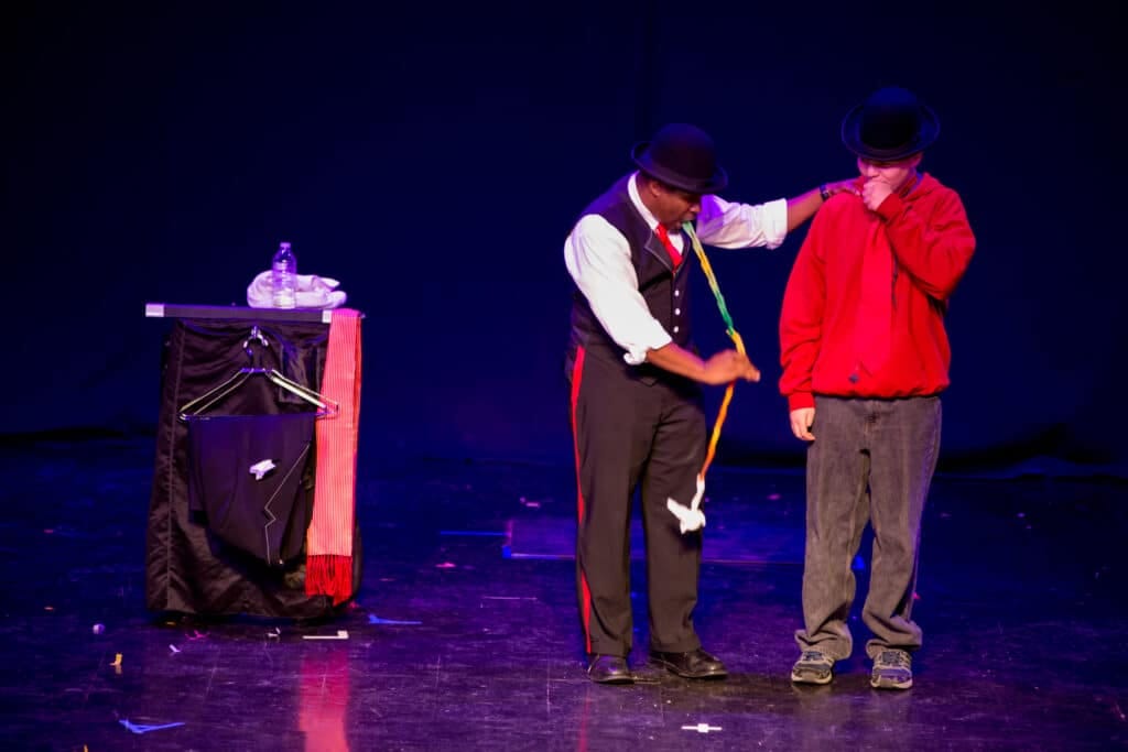Family-friendly magician from M Entertainment Services performing an interactive magic show in Indianapolis.