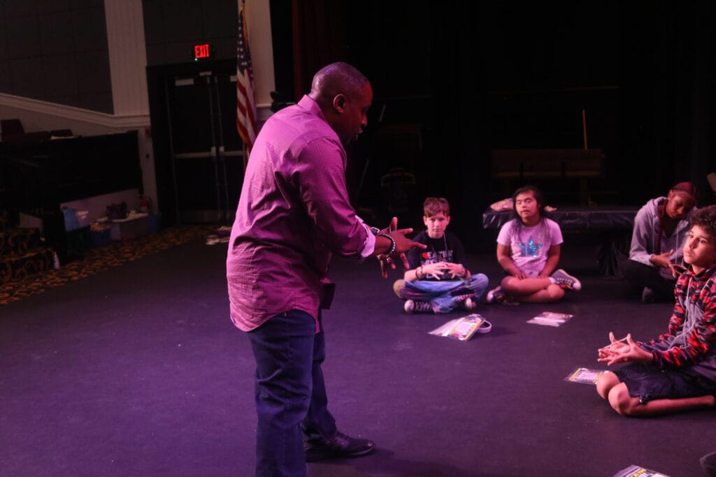 Indianapolis magician Jamahl Keyes performing interactive magic show for summer camp kids