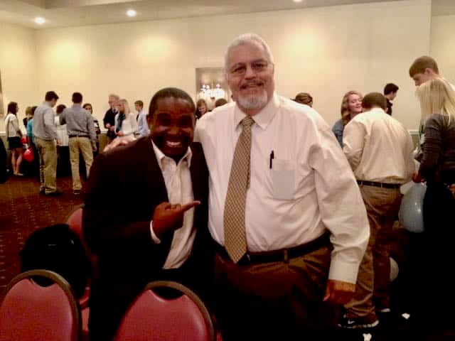 Indianapolis youth motivational speaker Jamahl Keyes with DECA event coordinator Tony Deangelo at regional DECA conference