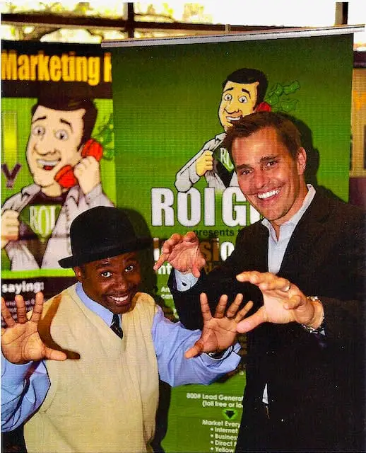 The Magic Comic Jamahl Keyes and Bill Rancic posing after comedy magic performance at JW Marriott Downtown Indianapolis Small Business Conference closing banquet.