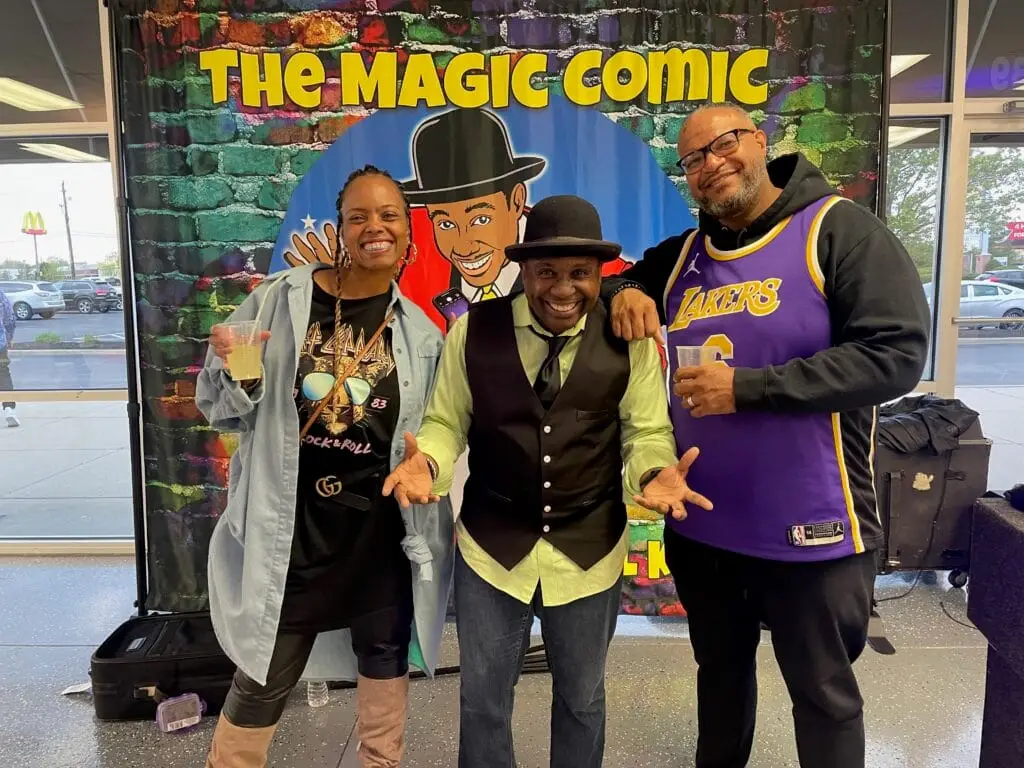 Mr. and Mrs. Porter smiling with Indianapolis magician Jamahl Keyes after their daughter’s Sweet 16 party in Greenwood, Indiana.