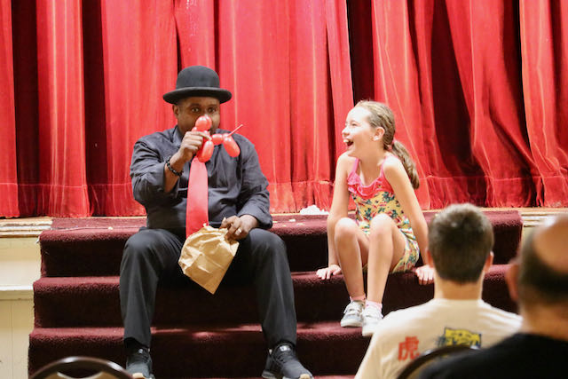 Jamahl Keyes performing interactive comedy magic for a kids birthday party audience in Indianapolis